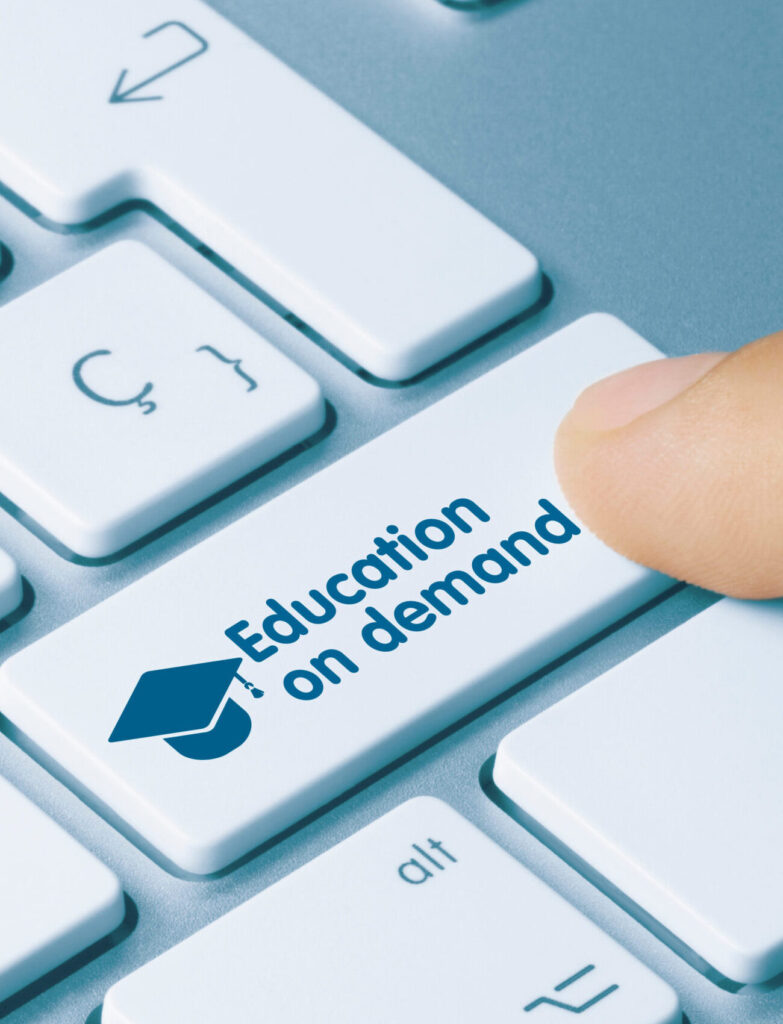 button on keyboard titled education on demand